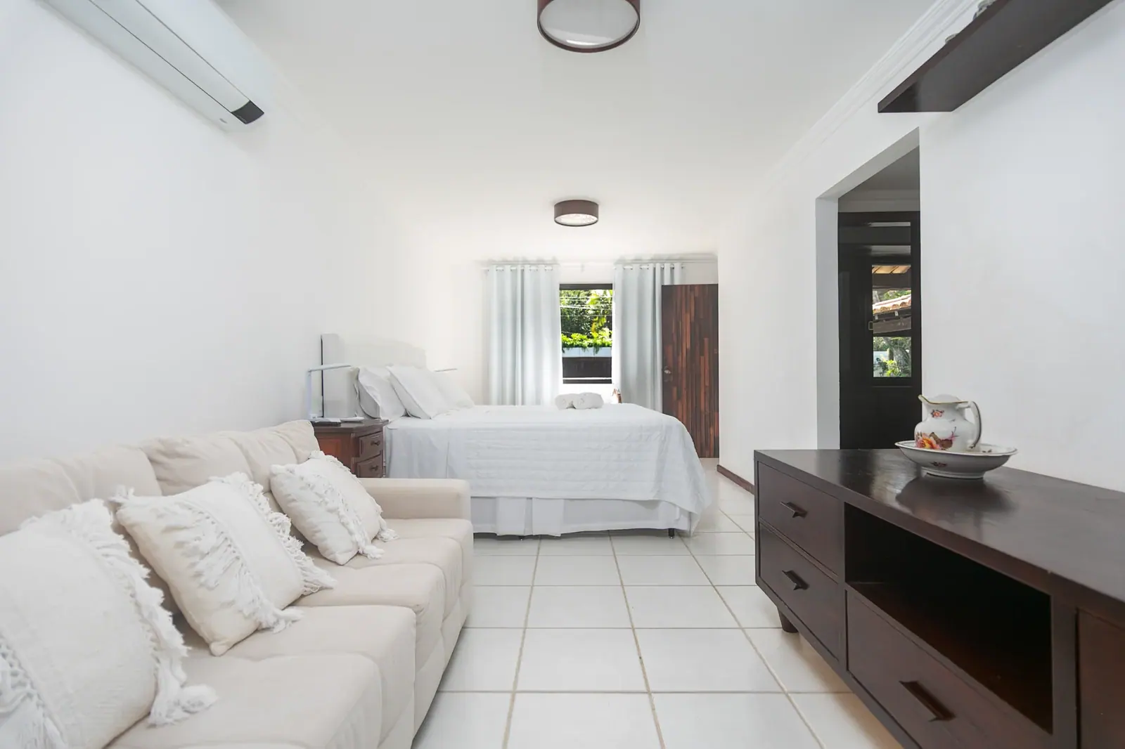 Quarto com estar integrado