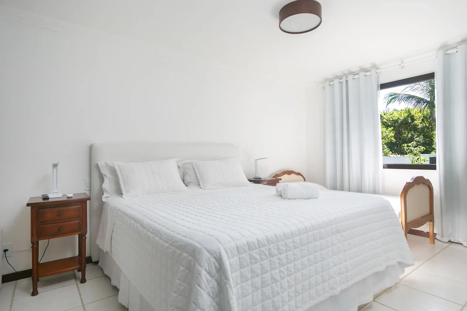 Quarto com estar integrado · cama